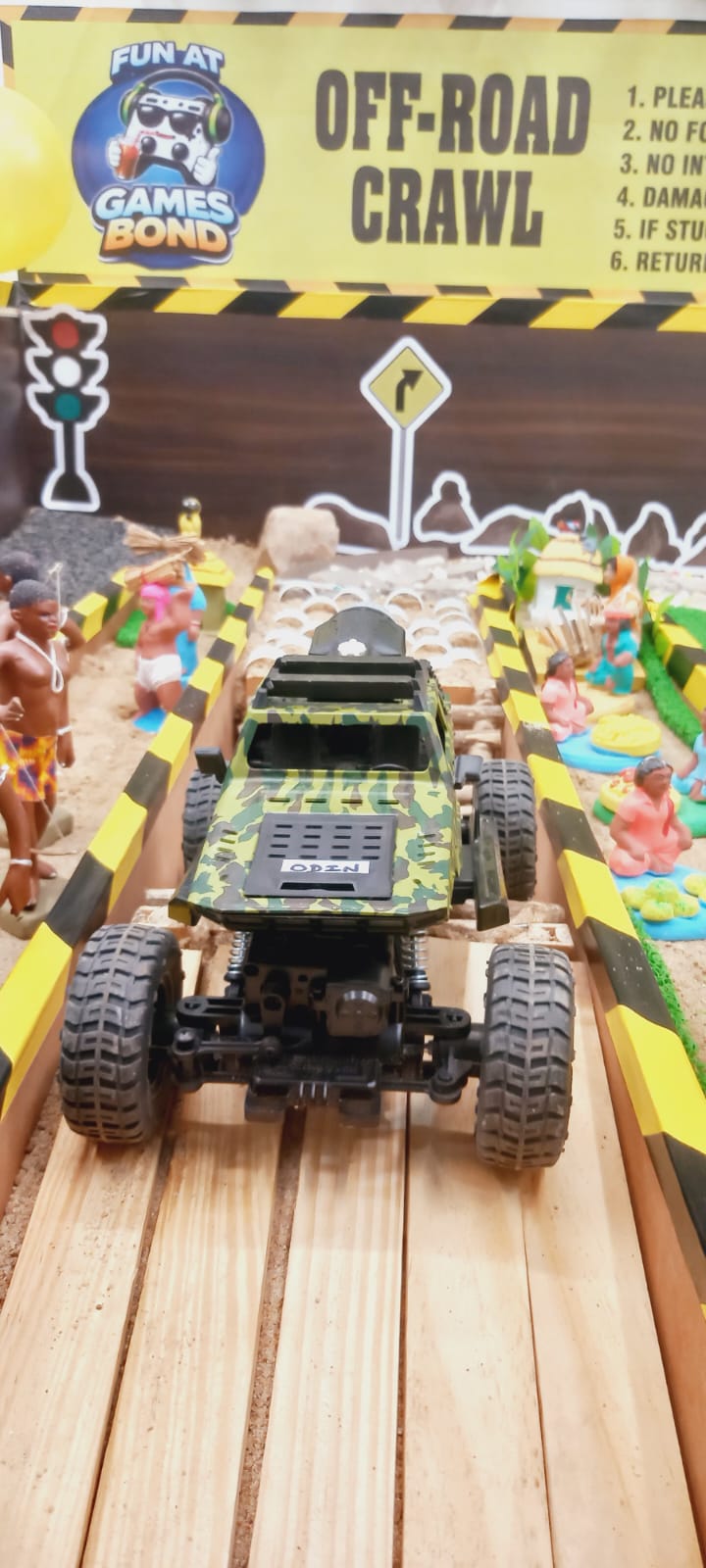 Off-road RC crawler on obstacle track
