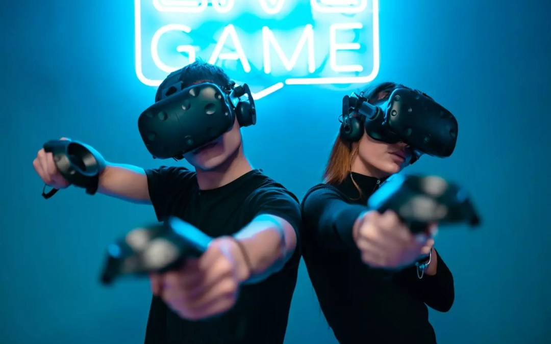 Two people playing immersive VR games with headsets